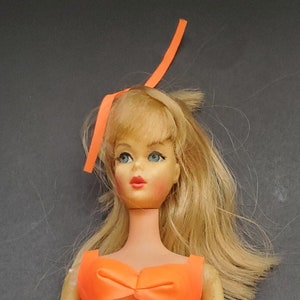 Vintage Barbie / Francie Doll 1970 Original Orange Plastic 2-piece swimsuit with Net cover side part vintage condition