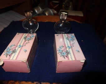 Two Vintage 5 Oz.  Empty Avon Bottles Of Moon Wind & Bird Of Paradise Cologne