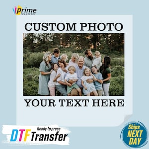 May include: A custom photo transfer design with a family photo of 12 people in a field. The text "YOUR TEXT HERE" is below the photo. The design is ready to press and ships next day.