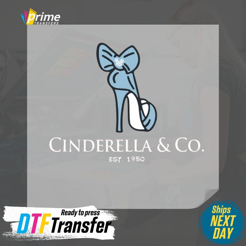 May include: A light blue high-heeled shoe with a bow design is the central image. The text "CINDERELLA & CO. EST. 1950" is below the shoe. The image also includes the text "Ready to press DTF Transfer" and "Ships NEXT DAY".