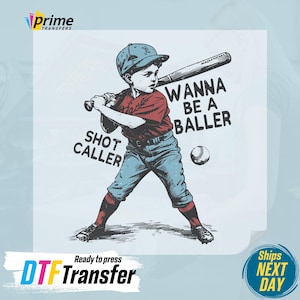 May include: A cartoon illustration of a young baseball player in a red and blue uniform, holding a bat and looking determined. The text "Wanna be a baller" is written above the player, and "Shot Caller" is written below. The image is a DTF transfer, ready to press.