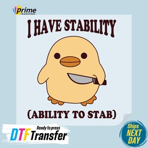 May include: A yellow cartoon chick holding a knife with the text "I HAVE STABILITY (ABILITY TO STAB)" on a blue background. The text "Ready to press DTF Transfer" is at the bottom of the image.