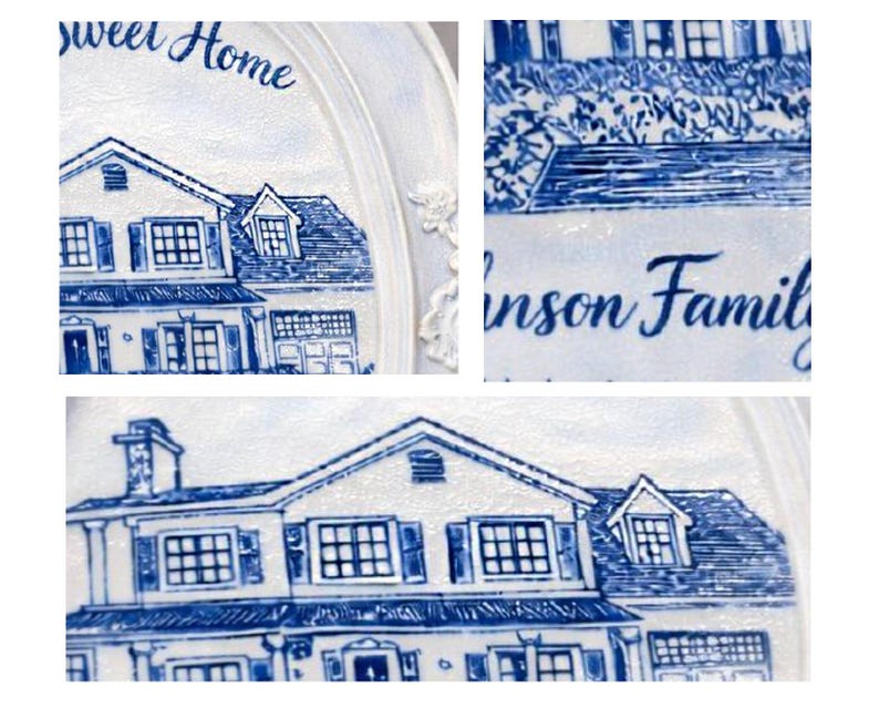 May include: A white decorative plate with a blue illustration of a house. The plate has the words "sweet Home" and "Johnson Family" written on it. The house illustration includes windows, a garage, and a chimney.