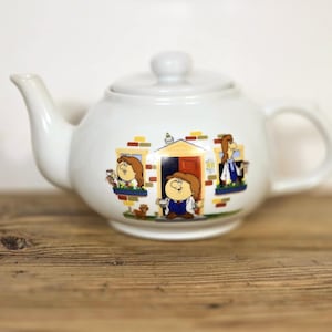 Vintage Tetley Tea Folk Teapot: UK Ceramic Advertising Collectible