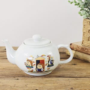 Vintage Tetley Tea Folk Teapot: UK Ceramic Advertising Collectible