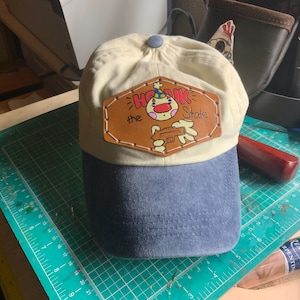 Honk the State, clown patch, on leather