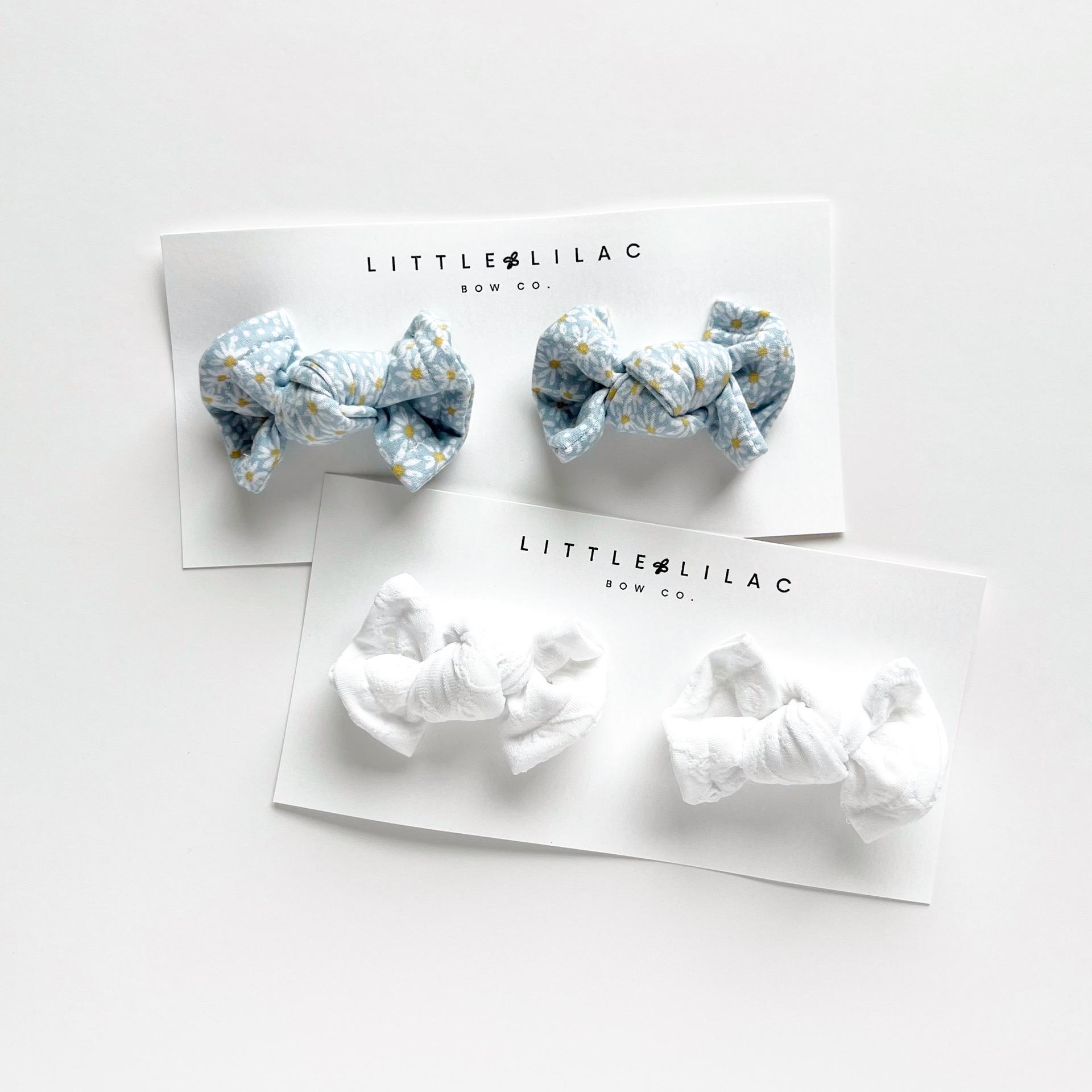 Blue Daisy and White Pig Tail Bows