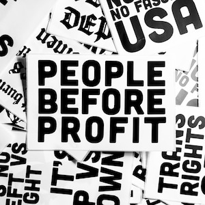 May include: Black and white text on a white background. The text reads "People Before Profit".
