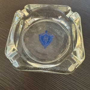 Vintage Hilton Hotel Ashtray – Glass with Blue Crest Logo, c. 1940s–50s Lounge Collectible