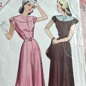 May include: Vintage fashion illustration featuring two women in dresses. One woman is in a pink dress with a belt, the other in a brown dress. Both dresses have cap sleeves and are knee-length. The illustration is on a textured paper background.