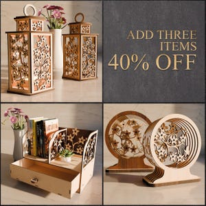 May include: A collection of wooden home decor items, including lanterns, a bookshelf, and decorative circular art pieces. The lanterns and bookshelf feature intricate floral cutouts. The text "ADD THREE ITEMS 40% OFF" is displayed.