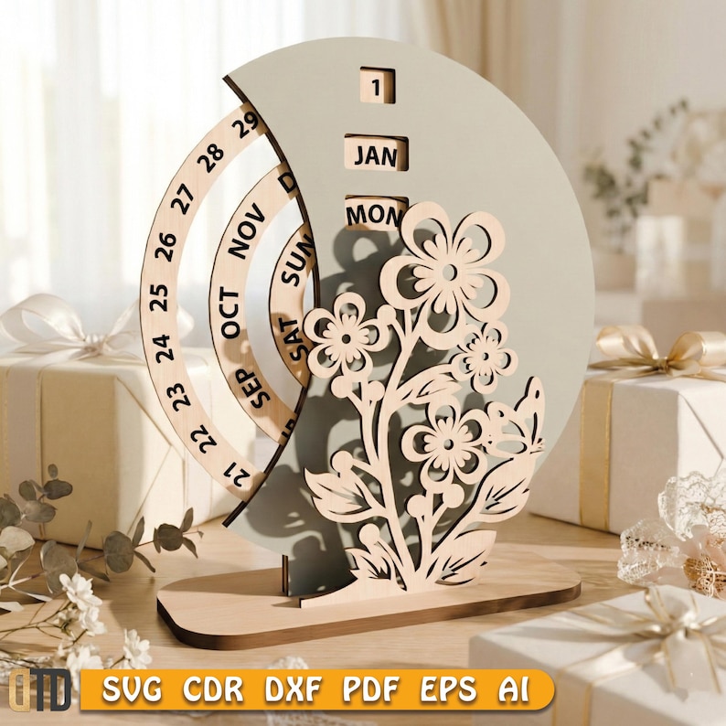 May include: A wooden perpetual calendar with a floral design. The calendar features a rotating ring for the days of the month, and blocks for the month and day. The base is rectangular, and the background is a light gray color.