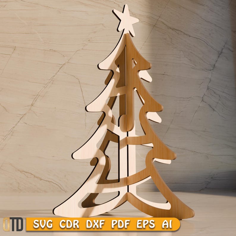 May include: A wooden Christmas tree with a star on top. The tree is made of light and dark brown wood, with a cutout design. The bottom of the image has the text "SVG CDR DXF PDF EPS AI".