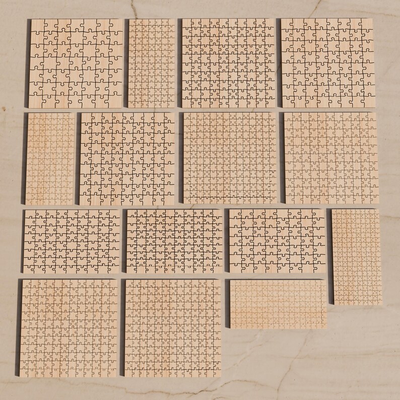 May include: A collection of fifteen light-colored wooden jigsaw puzzles of varying rectangular and square sizes, each featuring a distinct interlocking piece pattern laser-cut into the surface, arranged in a grid-like layout.