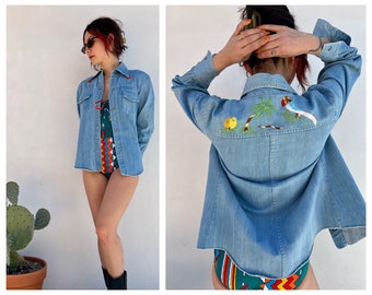 1970s Denim Embroidered Jacket / Light Wash Jean Jacket / Sunshine Embroidered Parrot Bird Palm Tree Coconut Island Theme