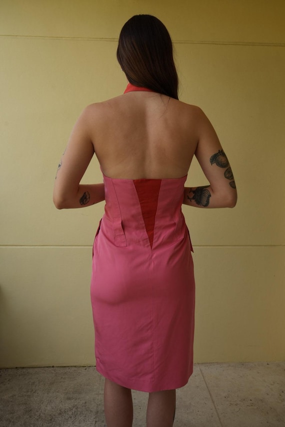 carolina herrera pink and red dress Carolina Herrera Fall 25 Collection designed by @WesGordon. @rejoice_chuol in a bold pink silk-organza mini dress with a strapless pintucked bodice, and dramatic train. Photography by @zoejbrt Styling by @charlottecolletcollet Makeup by @