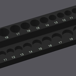 May include: Black plastic tool organizer with two rows of numbered compartments. The top row is labeled 10, 11, 12, 13, 14, 15, 16, 17, 19, and 22. The bottom row is labeled 10, 11, 12, 13, 14, 15, 16, 17, 19, and 22.