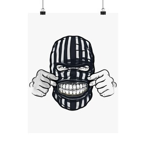 May include: A black and white striped balaclava with a menacing grin, the teeth are gold and the eyes are narrowed. The person is holding their cheeks with their hands.