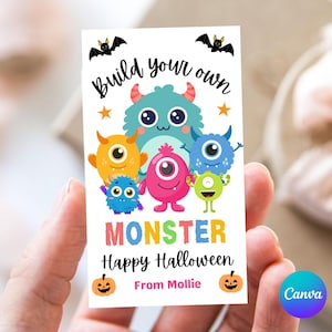 May include: A rectangular card featuring colorful cartoon monsters. The text "Build your own MONSTER Happy Halloween From Mollie" is displayed. The card includes illustrations of bats, stars, and pumpkins, perfect for Halloween.