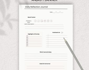 May include: A printable daily journal planner with the text "PRINTABLE DAILY JOURNAL PLANNER A4|A5 PLANNER". The journal includes sections for daily reflection, mood tracking, highlights, gratitude, and goals. A gray pencil rests on the page.