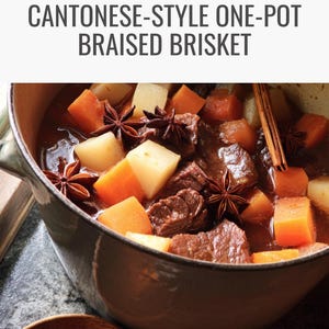 May include: A close-up of a pot of Cantonese-style braised brisket. The dish features large chunks of beef, carrots, and potatoes in a rich, dark sauce, garnished with star anise and cinnamon sticks. The pot is dark gray.