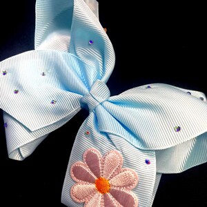Little girl 6 in. Big Bow-Grosgrain Ribbon Bow in a Baby Blue color-Daisy Patch with Rhinestones-Alligator Clip