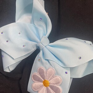 Little girl 6 in. Big Bow-Grosgrain Ribbon Bow in a Baby Blue color-Daisy Patch with Rhinestones-Alligator Clip