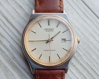 Vintage Orient Quartz Men's Watch – Classic Elegance with Leather Strap & Date Display – Timeless Collectible Timepiece, vintage gift