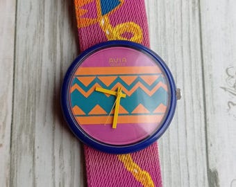 Vintage Avia Quartz Watch 90s – Retro Pop Culture, Colorful Fabric Strap, Unique Unisex Design, Swiss Brand, Collectible Watch.