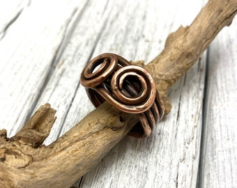 Entanglement. Solid, hand-hammered copper ring.