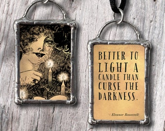 Better to light a candle...glass and pewter pendant with inspiring quote.