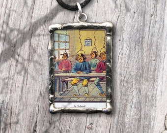 Pendant with witty quote by Mark Twain about education