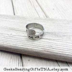 Hammered Aluminum Spiral Ring with Tolkien Quote, &quot;Not all those who wander are lost.&quot; By Geeks Bearing Gifts.