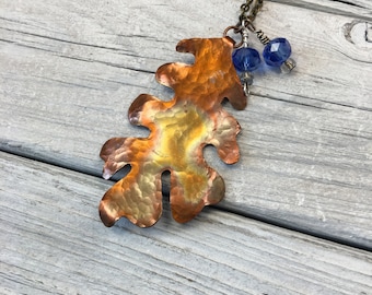 Oak leaf pendant in hammered copper with rich patina and Czech crystals by Geeks Bearing Gifts.