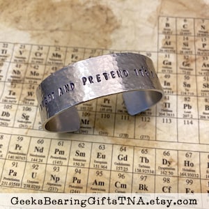 Hold Tight and Pretend its a Plan, 3/4 inch hand hammered, hand stamped aluminum cuff bracelet