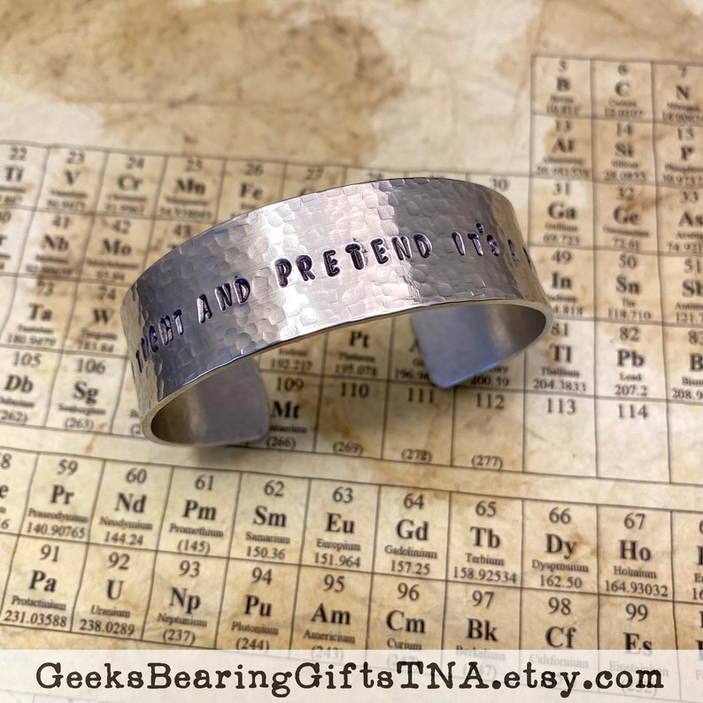 Hold Tight and Pretend its a Plan, 3/4 inch hand hammered, hand stamped aluminum cuff bracelet image 1