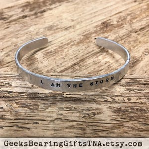 I AM THE STORM, 1/4 inch wide, hammered aluminum cuff bracelet with inspirational quote