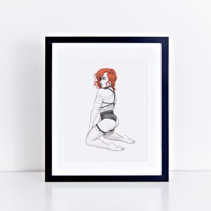 May include: A black and white illustration of a person with red hair wearing a black lingerie set with straps and garters. The person is kneeling with their back to the viewer and looking over their shoulder.
