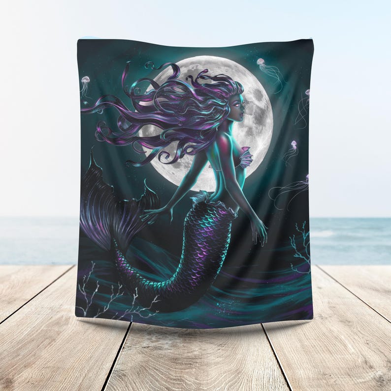 May include: A dark blue and purple mermaid with long flowing hair swims in front of a full moon. The mermaid's tail is a vibrant blue and purple with a shimmery finish. The background is a dark blue with a swirling pattern.