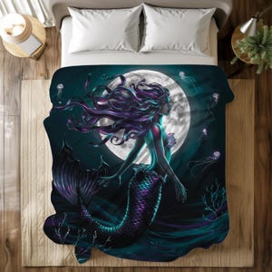 May include: A dark blue and purple mermaid with long flowing hair swims in front of a full moon. The background is a dark blue ocean with glowing jellyfish.