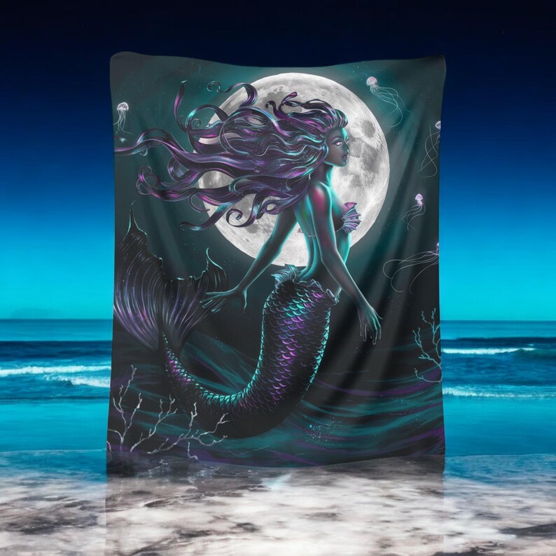 May include: A dark blue and purple mermaid with long flowing hair swims in front of a full moon. The moon is surrounded by a dark blue sky with white jellyfish.