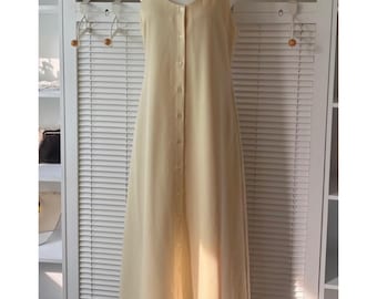 Vestido sem mangas com botões – alças ajustáveis com fivela, corte em A, detalhe de bolso, vestido de verão minimalista amarelo suave