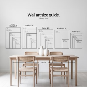 A minimalist dining space features light wood chairs and table with elegant ceramic vases, perfectly complementing the pink wall decor in a kids room wall art setup in the background. 

The clean, airy aesthetic offers a harmonious backdrop for a whimsical ballerina print suited for a ballerina nursery.