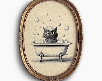 May include: An oval framed print featuring a black cat in a vintage bathtub filled with bubbles. The cat has large eyes and is surrounded by soap bubbles. The frame is gold with ornate detailing, and the text "FABLE & VEIL" is at the bottom.