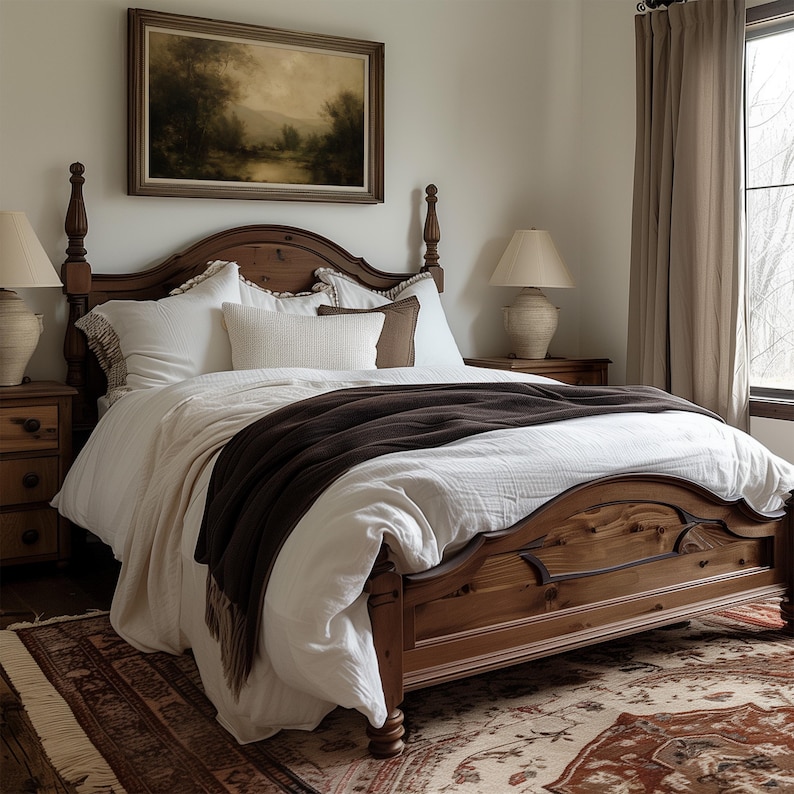 A moody vintage oil painting in an ornate frame complements the rustic wooden bed and cozy layers of white and brown, creating a serene farmhouse bedroom with warm lighting and soft, natural tones.