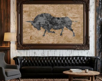 May include: A rectangular wall art piece featuring a dark gray, distressed silhouette of a bull centered on a textured, light brown background. The artwork is enclosed in a wide, dark brown, ornate, carved wooden frame with intricate detailing.