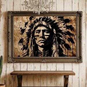 May include: A framed wall art piece featuring a high-contrast black ink illustration of a person wearing a traditional feathered headdress. The artwork is rendered in a sketch style on a textured, light brown background and encased in a dark frame.