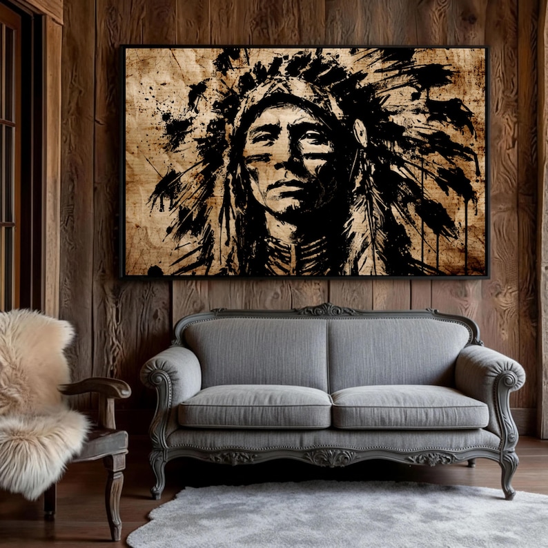May include: A rectangular wall art print featuring a high-contrast black ink illustration of a person wearing a traditional feathered headdress. The artwork is rendered in a distressed, textured style against a light tan, parchment-like background.