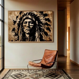 May include: A rectangular wall art print featuring a high-contrast black ink illustration of a person wearing a traditional feathered headdress. The artwork is rendered in a loose, expressive style against a textured, light tan background.