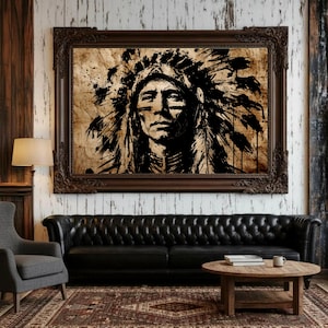 May include: A rectangular wall art piece featuring a high-contrast black ink illustration of a person wearing a traditional feathered headdress. The artwork is set against a textured, light brown background and enclosed in a dark brown ornate frame.